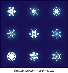 Kit of simple christmas snowflakes on blue background. Creative concept expressive forms and colors. Vector illustration - shapes. White winter crystals, isolated, modern trendy design elements.