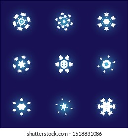 Kit of simple christmas snowflakes on blue background. Minimal concept expressive forms and colors. Vector illustration - graphics. White winter crystals, isolated, modern trendy design elements.