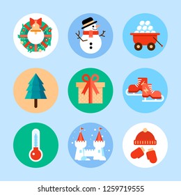 Kit of winter leisure symbols and icons: snowman, snowballs, skates, ice castle, house decorations, wreath, cup of hot aroma coffee, snowball carriage. Vector flat icons and illustration