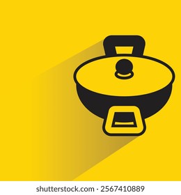 kitchen pan icon with shadow on yellow background