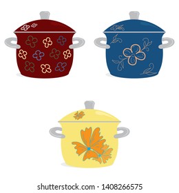 Kitchen set dishes. Three enameled pots for cooking red blue yellow with a pattern on a white background