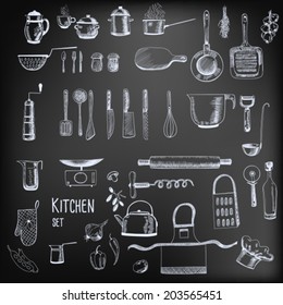 Kitchen set. Large collection of hand - drawn  kitchen related objects on chalkboard background. 