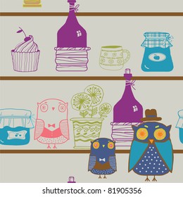 kitchen shelf with bottles, cupcakes and owls