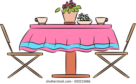 Kitchen table with houseplant and cup