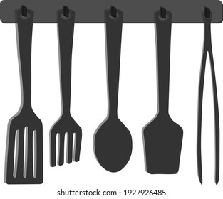 KITCHEN UTENSILS: baking spatula, scraper, serving spoon, spatula. Wooden kitchen accessories.