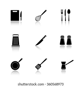 Kitchenware Drop Shadow Black Icons Set. Cutting Board, Grater, Iron Skillet And Spatula Symbols. Kitchen Tools Items. Cooking Equipment. Cuisine Instruments. Logo Concepts. Vector Illustrations