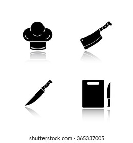 Kitchenware drop shadow black icons set. Chef hat, sharp knife, butcher chopper and cutting board. Restaurant kitchen tools items. Cooking equipment. Logo concepts. Vector illustrations