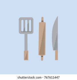 Kitchenware, A flipper used in frying and knife on blue pastel background