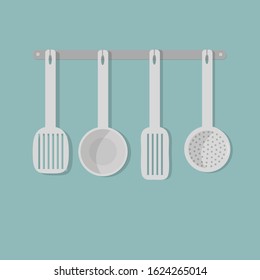 Kitchenware: ladle, slotted spoon, spatula. Vector, flat stile