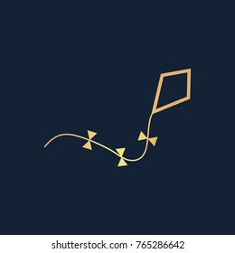 Kite icon flat. Simple gold pictogram on dark background. Vector illustration symbol