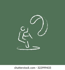Kite surfing hand drawn in chalk on a blackboard vector white icon isolated on a green background.