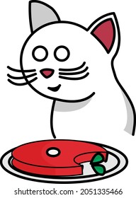 Kitten in front of gourmet food plate

