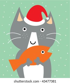 kitten with his loving fish in xmas