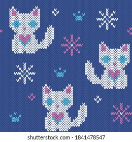 Kitten jacquard knitted seamless pattern. Winter background with cute cat. Vector illustration.