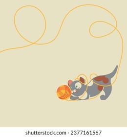 A kitten is playing with a ball of thread.