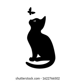 A kitten sits and looks at a flying butterfly. Black silhouette of a cat isolated on white background. The symbol of Halloween. Can be used as a sticker template, logo element, icon for web design.
