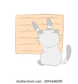 a kitten who sharpens claws on a scratching post