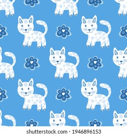 Kittens on a blue background with flowers. For textile, fabric, packaging paper, background, wallpaper.