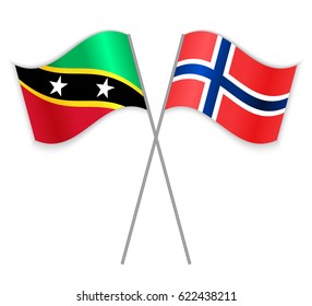 Kittitian and Norwegian crossed flags. Saint Kitts and Nevis combined with Norway isolated on white. Language learning, international business or travel concept.