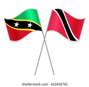 Kittitian and Trinidadian crossed flags. Saint Kitts and Nevis combined with Trinidad and Tobago isolated on white. Language learning, international business or travel concept.
