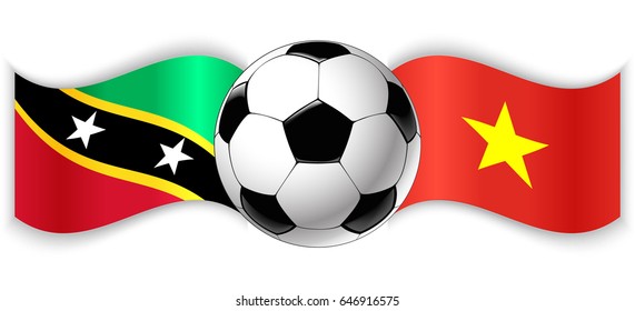 Kittitian and Vietnamese wavy flags with football ball. Saint Kitts and Nevis combined with Vietnam isolated on white. Football match or international sport competition concept.
