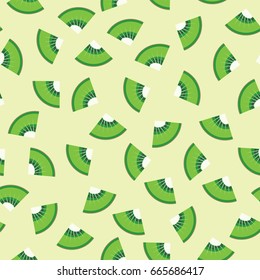 Kiwi fruit graphic design sliced in triangle pieces and arranged into seamless pattern background.