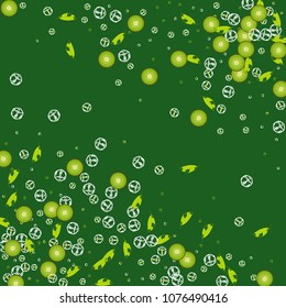 Kiwi on a green background. Cocktail. Fruit background. Summer background with kiwi and ice. Cubes of ice and kiwi.