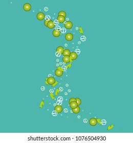Kiwi on a green background. Cocktail. Fruit background. Summer background with kiwi and ice. Cubes of ice and kiwi.