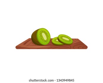 Kiwi on wooden cutting board on white background.
