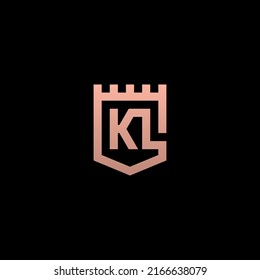 KL monogram logo inside fort shield shape with gold gradient color.