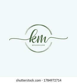 KM Initial handwriting logo vector