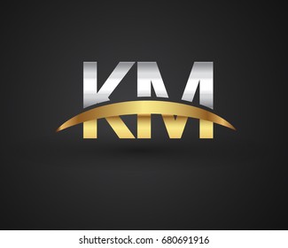 KM initial logo company name colored gold and silver swoosh design. vector logo for business and company identity.
