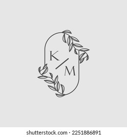 KM initial monogram wedding with creative oval line