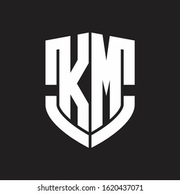 KM Logo monogram with emblem shield shape design isolated on black background