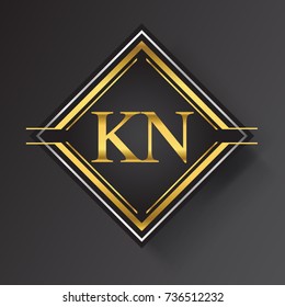 KN Letter logo in a square shape gold and silver colored geometric ornaments.