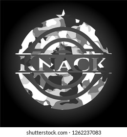 Knack on grey camouflaged texture
