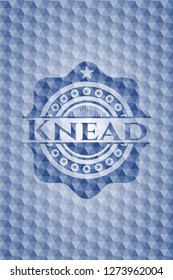 Knead blue polygonal badge.