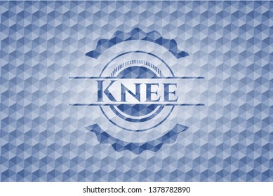 Knee blue emblem with geometric background.