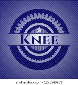 Knee emblem with jean background