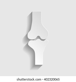 Knee joint  sign. Paper style icon