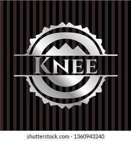 Knee silvery badge