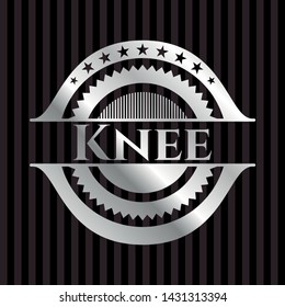 Knee silvery emblem. Vector Illustration. Mosaic.