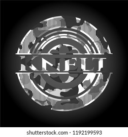 Knelt on grey camouflage pattern