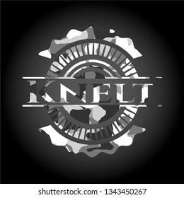Knelt on grey camouflage pattern