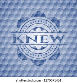 Knew blue badge with geometric background.