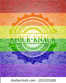 Knick-knack on mosaic background with the colors of the LGBT flag