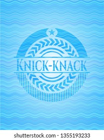 Knick-knack water representation badge.