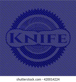 Knife badge with denim texture