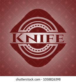 Knife badge with red background