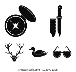 Knife with a cover, a duck, a deer horn, a compass with a lid..Hunting set collection icons in black style vector symbol stock illustration web.